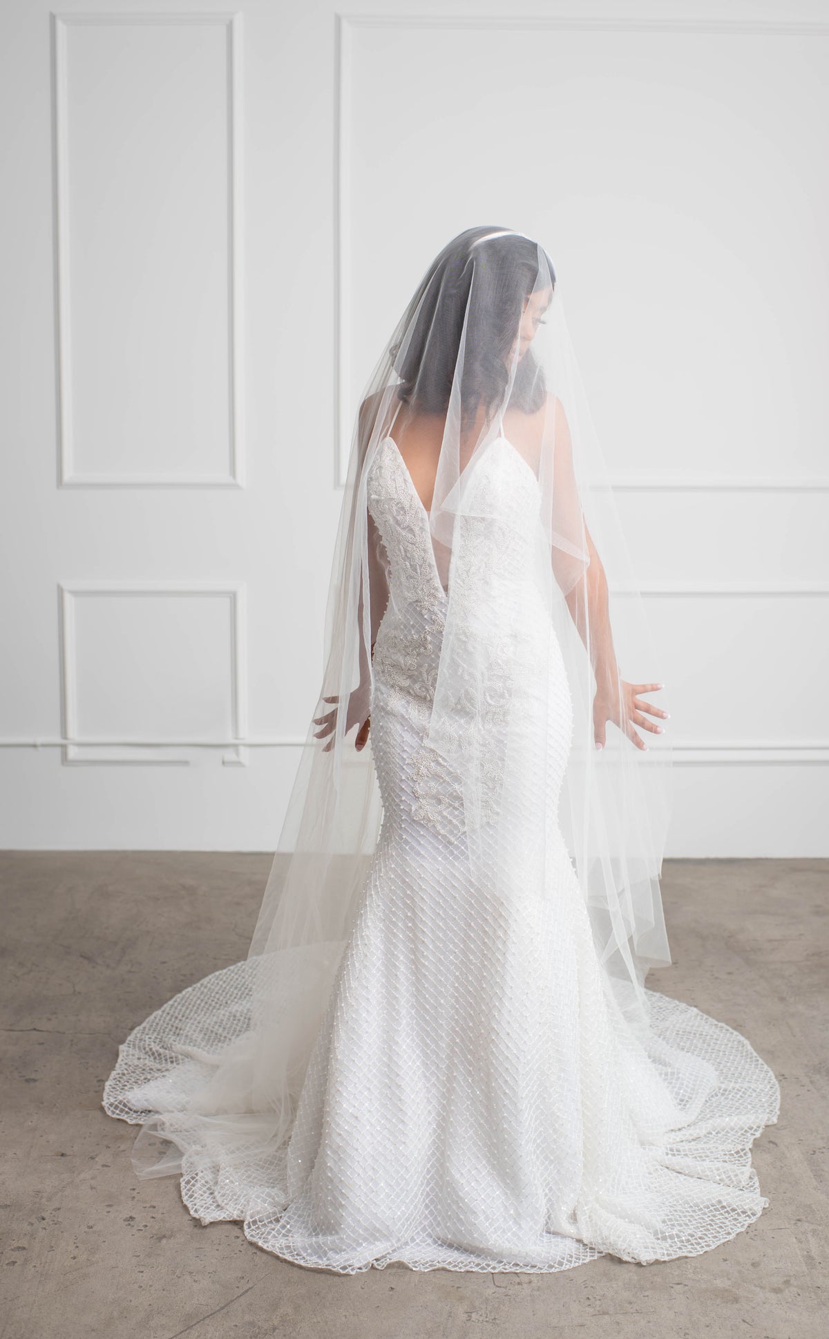 Modern bride in wedding dress with couture steel boning and luxurious satin lining for amazing structured fit