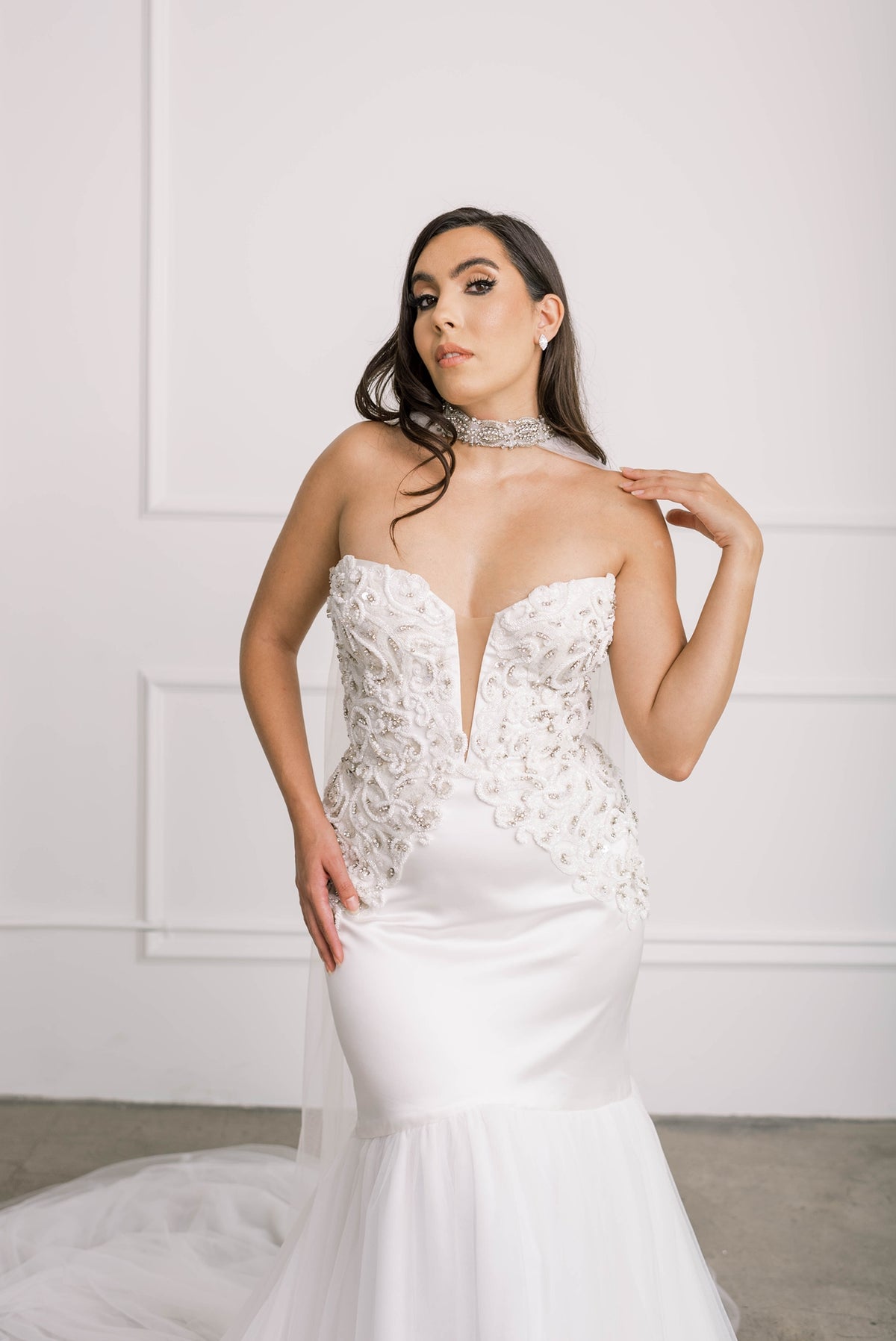 Beautiful beaded wedding dress with stunning, intricate design paired with cape