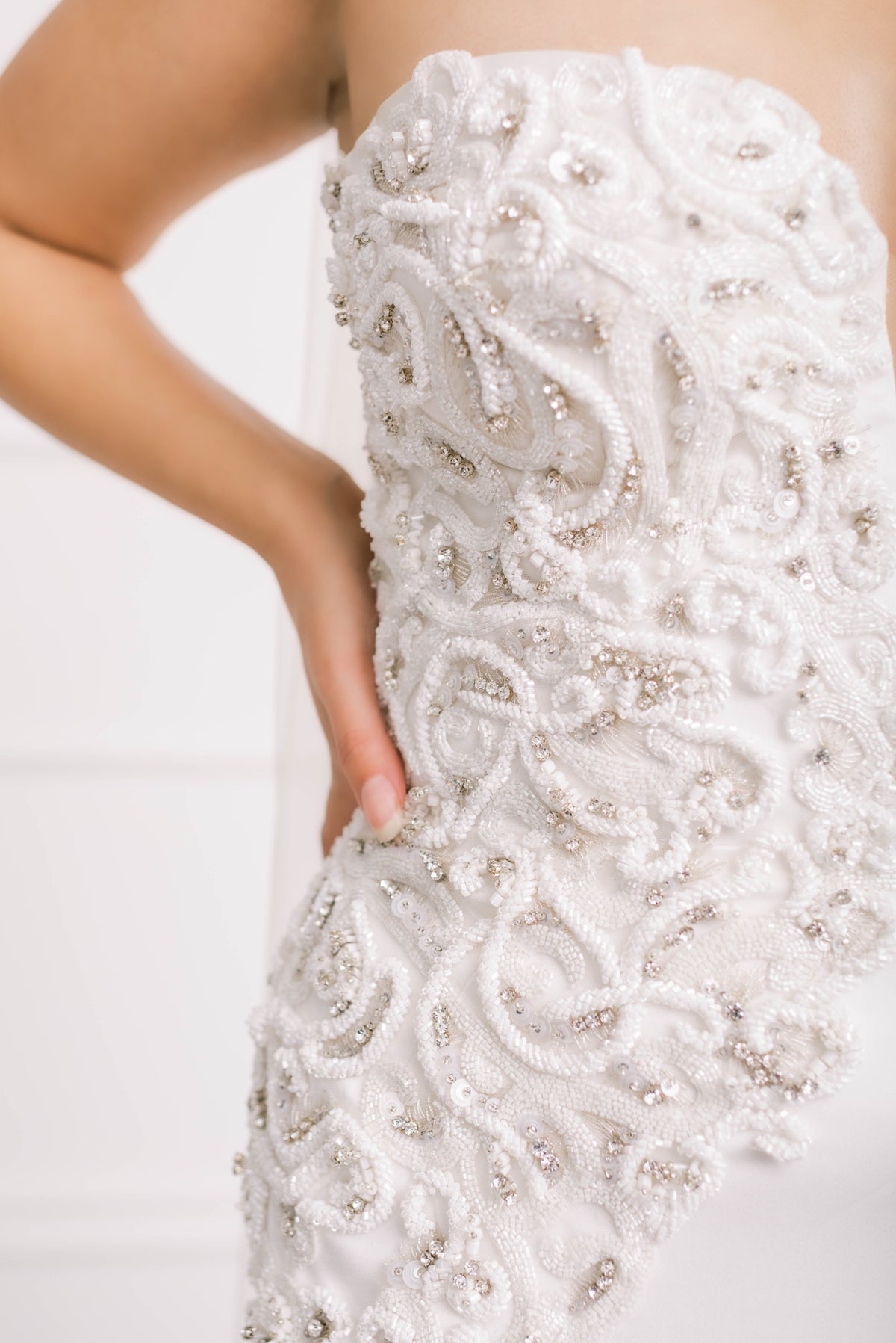 Detailed work of wedding dress with luxury beading, custom made for bride