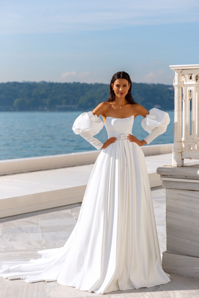 Rita Lanesta Wedding Dress Available at Lawrencia Bridal Couture in Los Angeles Satin Ball Gown with Statement Poof Puffy Sleeves Trendy Fashion Forward Wedding Dress