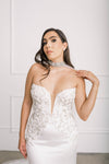 Elegant bride wearing the Simone Cape, a perfect alternative to a traditional bridal veil or cape.