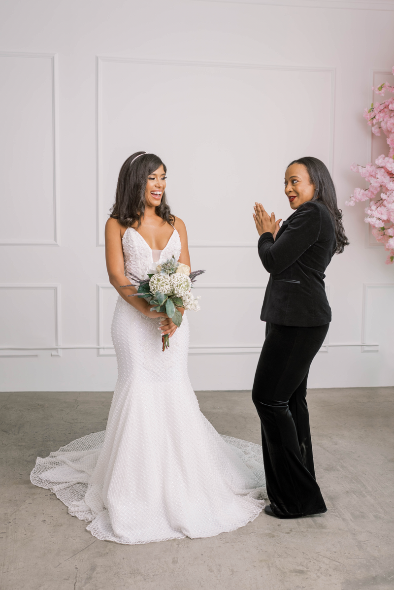 Designer and bride meeting one-on-one in exclusive, VIP wedding dress shopping experience