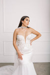 Bride wearing the statement luxury Swarovski Crystal Choker Cape, with a stunning jewel studded design.