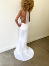 Back view of classic hollywood glamour wedding dress with delicate straps made of stretch satin